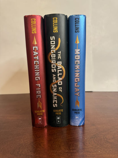 Cover of The Hunger Games 3-Book Bundle: Catching Fire, Mockingjay & The Ballad of Songbirds and Snakes by Suzanne Collins