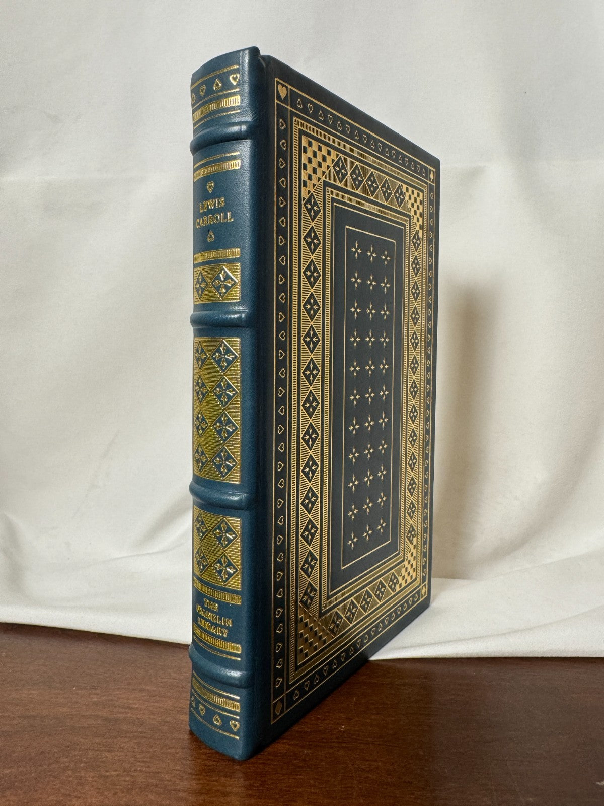Cover of Alice's Adventures in Wonderland & Through the Looking-Glass by Lewis Carroll