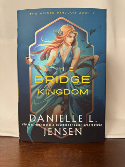 Cover of The Bridge Kingdom by Danielle L. Jensen, Deluxe Edition Hardcover with Designed Sprayed Edges