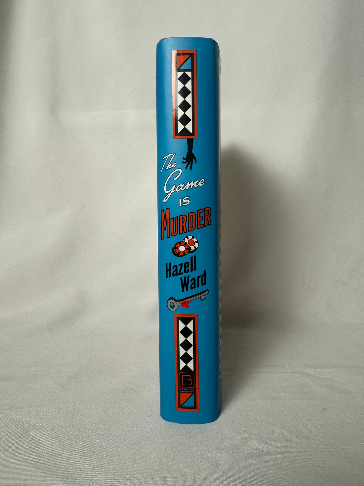 The Game Is Murder by Hazell Ward hardcover – photo 2