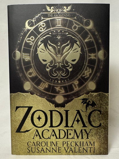 Cover of Zodiac Academy 1: The Awakening by Caroline Peckham & Susanne Valenti, Paperback Re-Issue with Bonus Chapter