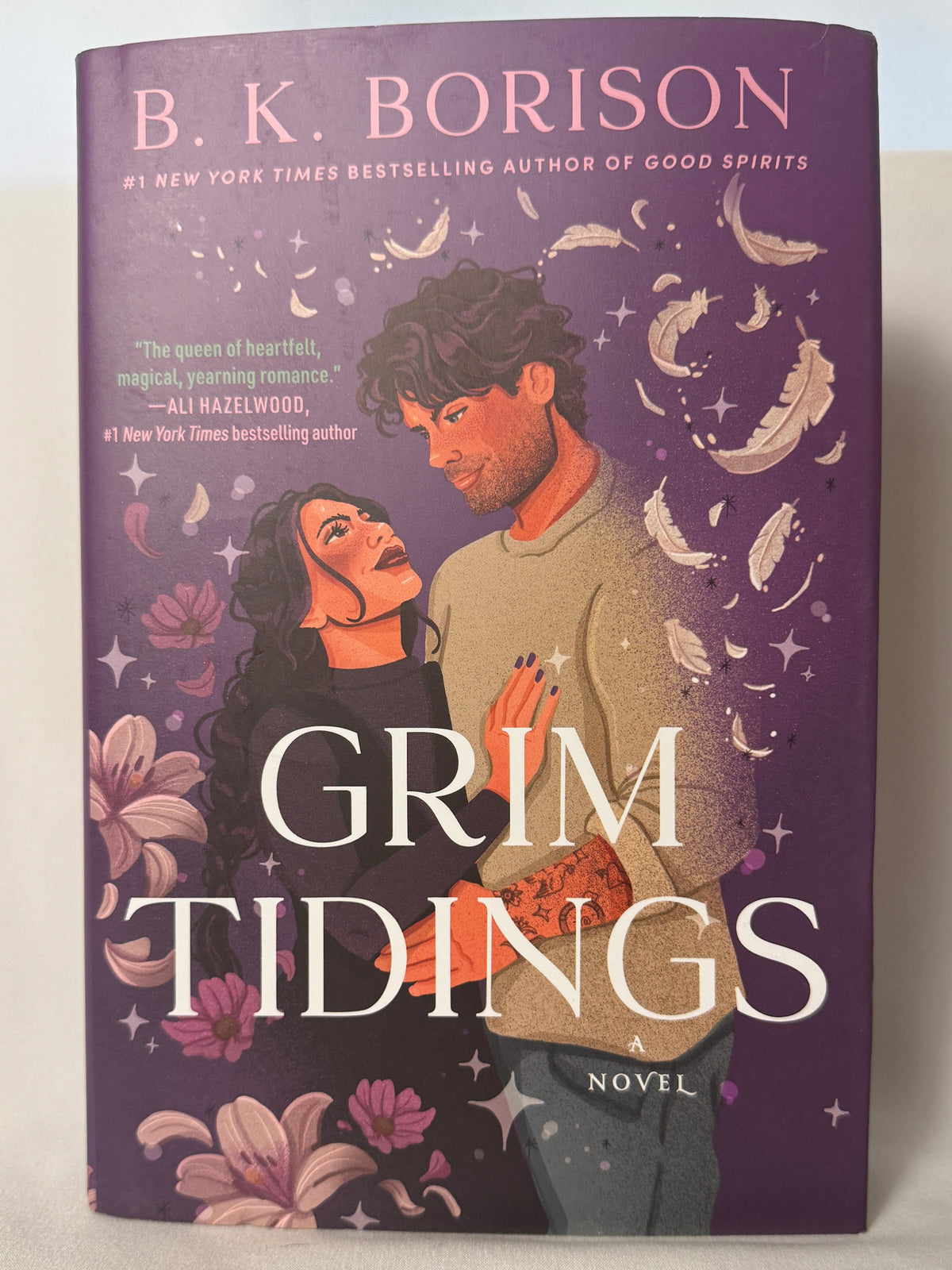 Cover of Grim Tidings: A Grim Reaper x Guardian Angel Romance (Ghosted, Book 2) by B.K. Borison, Hardcover