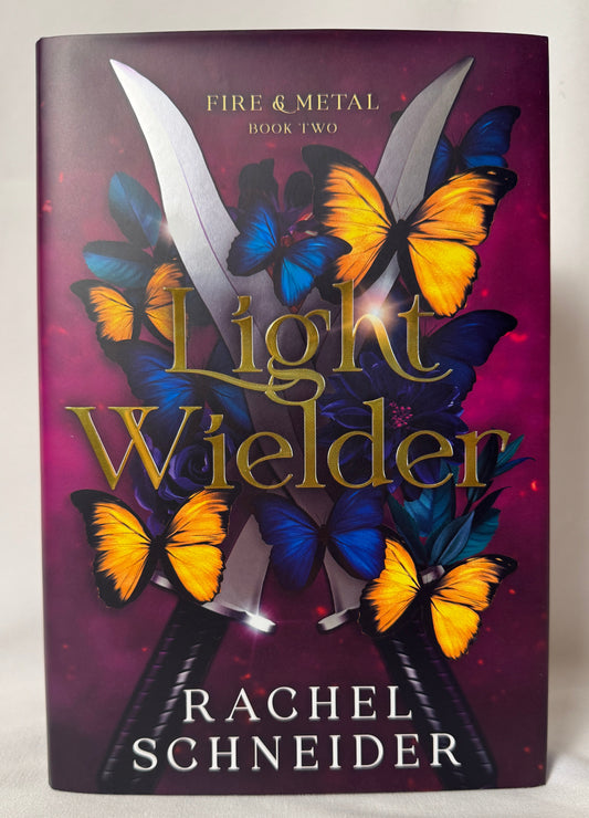 Cover of Light Wielder (Fire & Metal, Book 2) by Rachel Schneider, Luxe Edition Hardcover with Gilded Edges & Foiled Cover