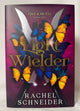 Cover of Light Wielder (Fire & Metal, Book 2) by Rachel Schneider, Luxe Edition Hardcover with Gilded Edges & Foiled Cover
