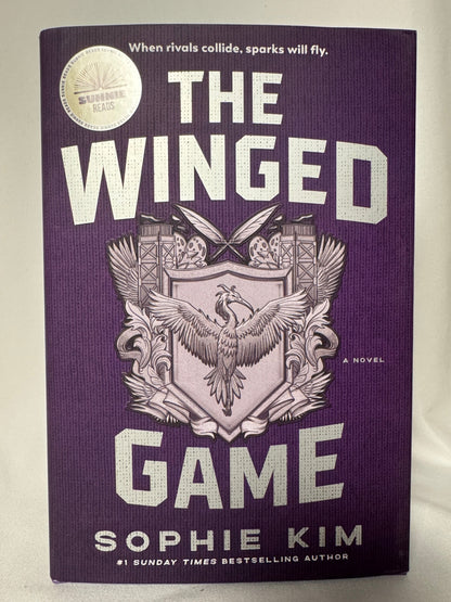 Cover of The Winged Game by Sophie Kim, First Edition Hardcover with Sprayed Edges